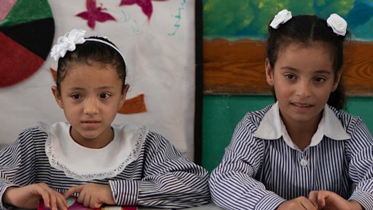 Girls sit inside a classroom at an UNRWA school during the first day of a new school year in Gaza City this week.