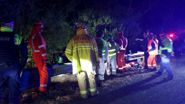 Emergency crews working to free the trapped woman on the Princes Highway.