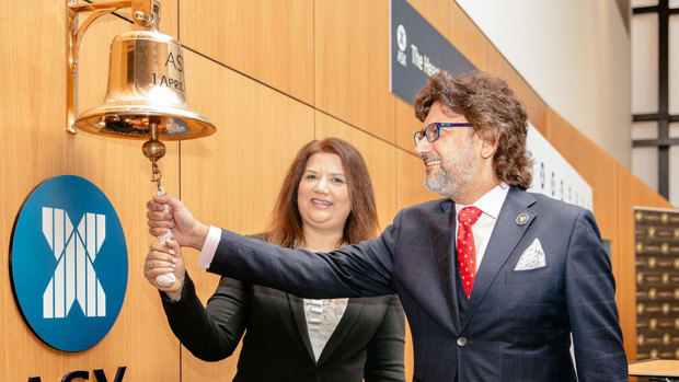 Victory Offices CEO Dan Baxter rings the bell on the company's ASX listing. 