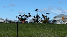 Two children have been rushed to hospital after high winds lifted a jumping castle into the air during a party southwest of Melbourne.