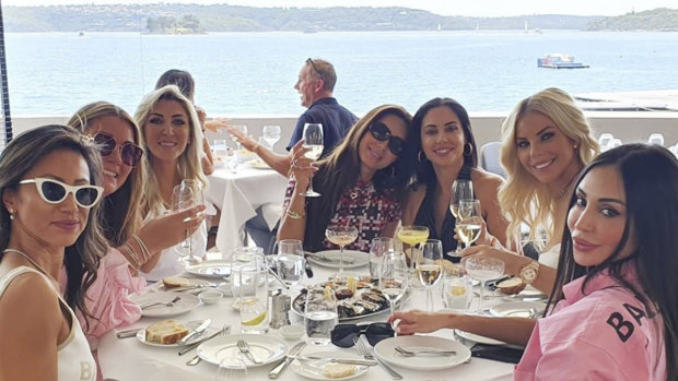 Last supper:  Sydney's ladies who lunch in pre-lockdown at Rose Bay's Catalina, from left Elaine Kwan, Maude Tzaneros, Barbara Coombes, unknown,  Laura Ibrahim, Elle Touma and Hannah Toohey.