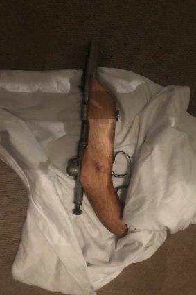 A gun that was seized by police in a recent search.