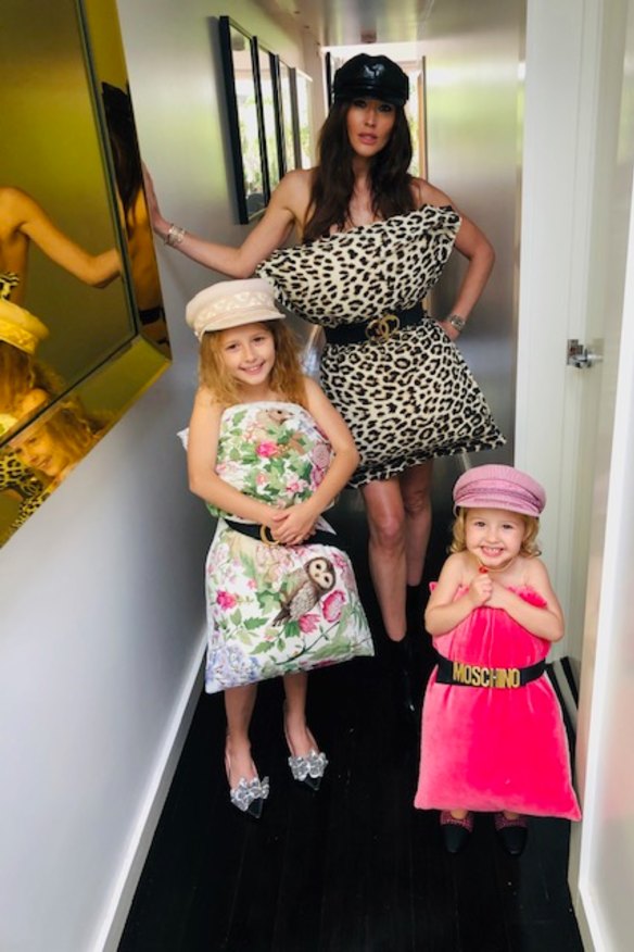 Clementine McVeigh does the 'pillow challenge' with her daughters, Lolita-Luella (left) and Florence.