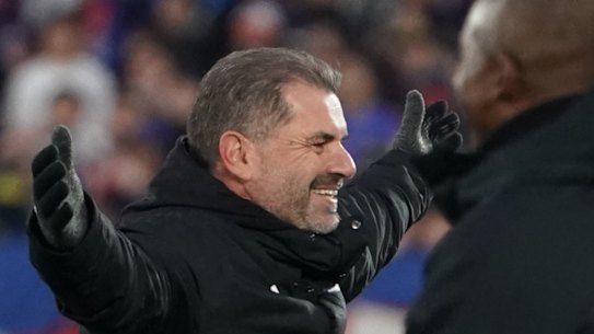 Ange Postecoglou celebrates after Yokohama F. Marinos clinched the J.League title on Saturday.