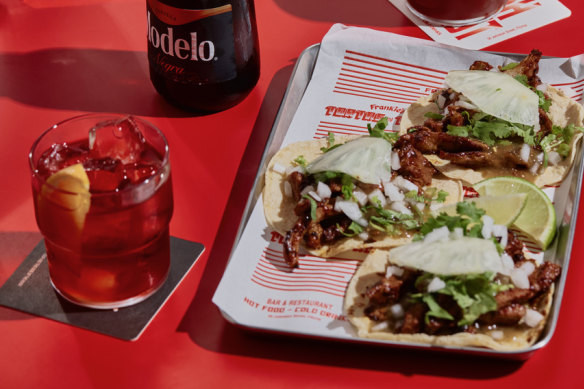 Al pastor tacos with grilled pork, salsa verde and pineapple. 