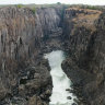 Victoria Falls' bare cliffs raise spectre of no water as drought bites