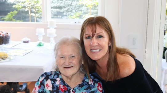 Maria Loro (left) with her daughter Rosy Clarkson at her aged care facility in Melbourne.