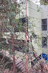 The original Australian Environmental Studies building was designed to blend in with the bush environment.
