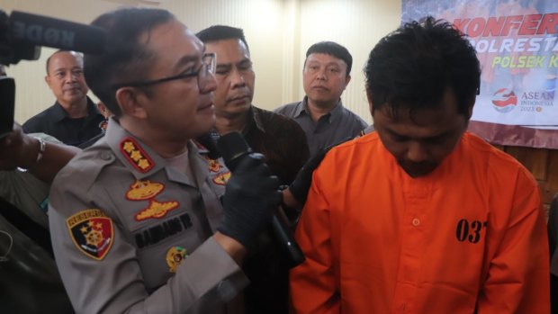 Gede Wijaya is paraded by Bali police at a press conference on Friday.