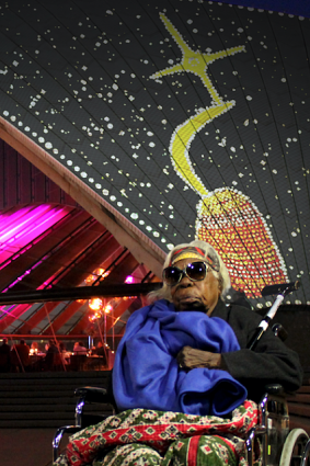 Mabel Juli with an artwork inspired by the Garnkiny site projected onto the Sydney Opera House in 2018.