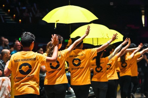 The Hong Kong Cultural Association of South Australia, seen in a performance earlier this year. They wanted to use umbrellas as one of their props for a workshop at the OzAsia festival in Adelaide. 