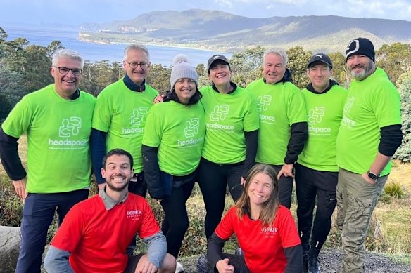 AFL head of mental health and wellbeing Dr Kate Hall (wearing beanie), and to her right AFL executive general manager of football Laura Kane during their recent Three Capes Track walk for mental health charity Headspace.