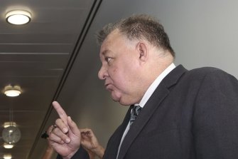 Shadow Minister for Education and Shadow Minister for Women Tanya Plibersek and Liberal MP Craig Kelly have a heated discussion as they cross paths in the corridor of the press gallery in between media interviews, at Parliament House in Canberra on  Wednesday 3 February 2021. fedpol Photo: Alex Ellinghausen