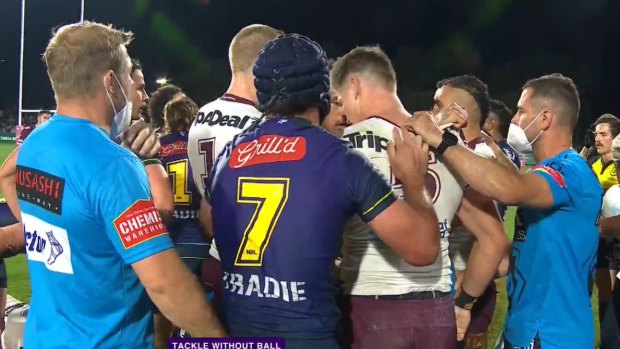 Melbourne and Manly trainers involved in a melee during the first finals match.