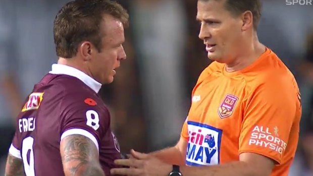 A Maroons trainer assesses Jake Friend.