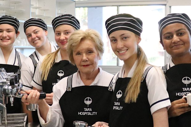 Teacher Judy Cropper with some of her HSC students. She says for exam success use the NESA syllabus, apply your knowledge and manage your time effectively.