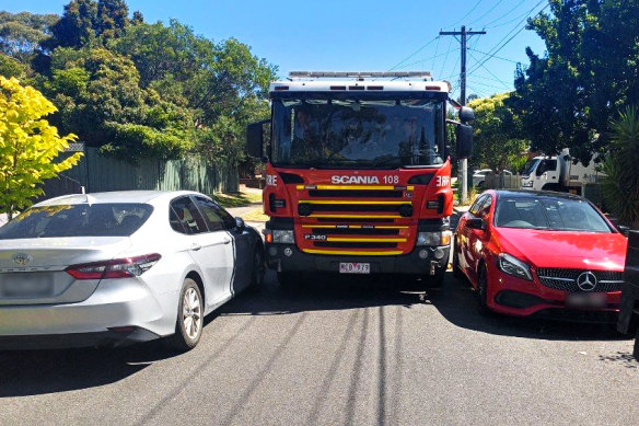 A fire truck struggling to pass parked vehicles in some of Macleod’s narrow streets.