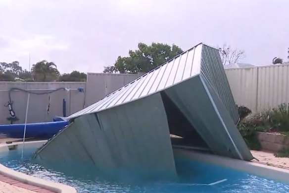 A shed landed in a neighbour’s pool.