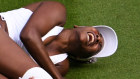 Venus Williams goes down injured in her clash with Elina Svitolina.