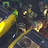 Emergency services freeing the teenager from underneath the train at North Melbourne station on Monday. 