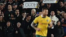 Fans boo as Quade Cooper of the Wallabies is given a yellow card at Eden Park in 2015.