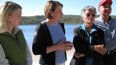 Then-Climate Change and Sustainability Minister Kate Jones, former Queensland Premier Anna Bligh and Quandamooka elder Aunty Joan Hendriks at the 2010 announcement of the national park zoning on North Stradbroke Island.