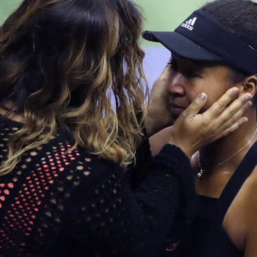 Osaka is hugged by her mum, Tamaki, after defeating Serena Williams in the 2018 US Open final.