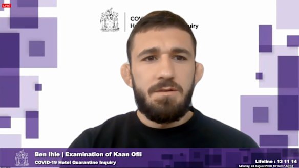 Returned traveller Kaan Ofli appeared before the hotel inquiry on Monday. 