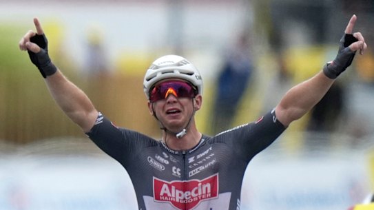 Kaden Groves crosses the finish line to win the twentieth stage of the Tour de France on Saturday.