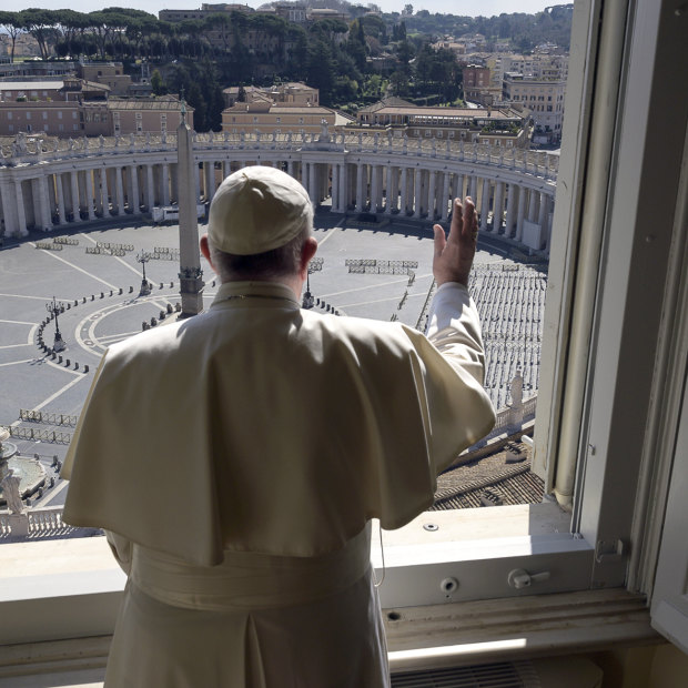 Pope Francis delivers his blessing from inside the Apostolic Library at the Vatican on Sunday.