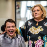 Sandy Guy with her son Liam, who was abused by his taxi driver.