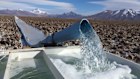 Lithium-rich brine is pumped into evaporation ponds in Chile.