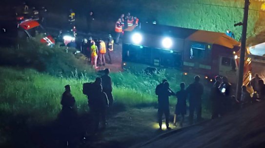 Emergency services respond at the scene of the collapse, in an unverified image.