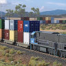 An artist’s impression of a double-stacked freight train on the Inland Rail between Melbourne and Brisbane.