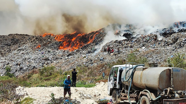 After hinting at shamans, Bali turns to science to tackle landfill fire