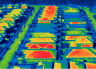 The urban heat island effect, seen through infrared imaging, shows the difference in temperatures black roofs make.