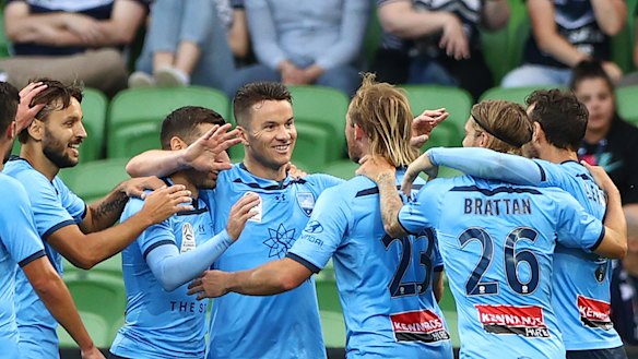 Sky's the limit: Sydney FC players celebrate after Adam Le Fondre put his side on the path to claiming bragging rights in the Big Blue at AAMI Park.