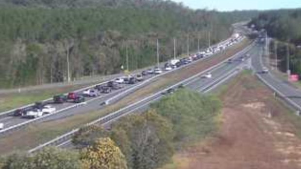 A south-facing traffic camera shows delays on the Bruce Highway at Glasshouse Mountains about 3pm on Sunday.