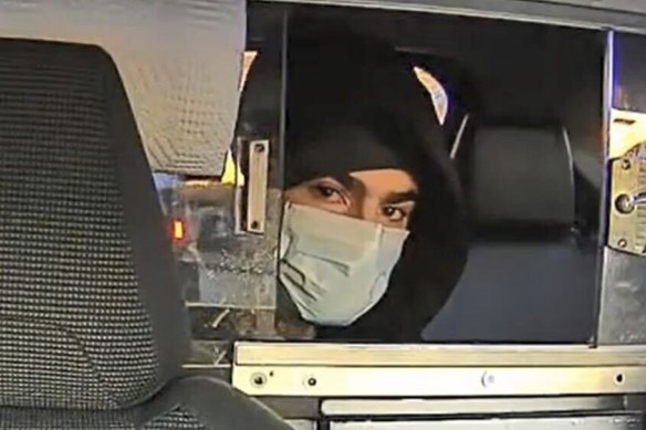 A new image released by New York police of the suspect in a taxi.