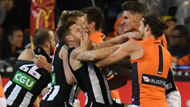 A melee breaks out at half-time at the MCG.