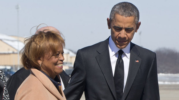 Marian Robinson in 2015 with her son-in-law, then-president Barack Obama.