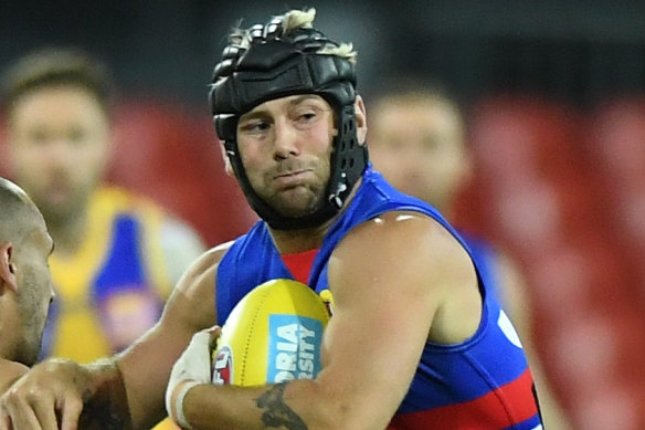 Caleb Daniel wears a helmet and says he'd support teammates doing the same. 