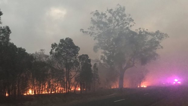 Crews continue to battle the flames north of Bundaberg as a new threat emerges inland from Mackay.