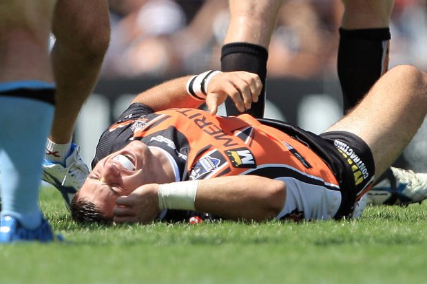 James Tedesco writhes in agony after tearing his ACL during his debut in 2012.