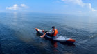 The writer in his kayak, paddling solo through the waters off northern Bali. 