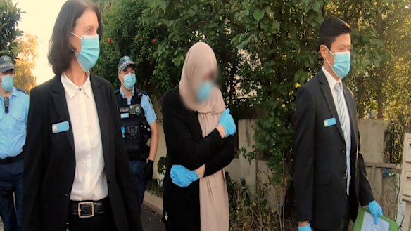 Detectives seized documents, laptops and several electronic devices for forensic examination.