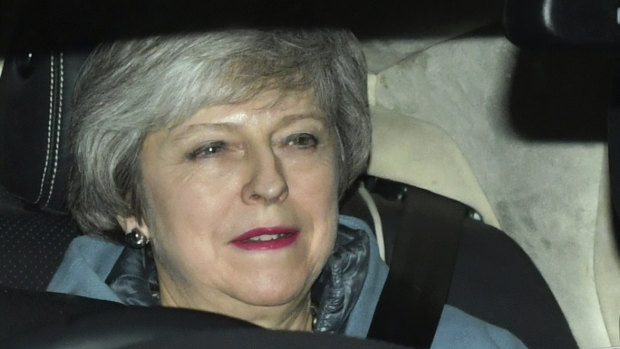 Britain's Prime Minister Theresa May leaves the Houses of Parliament in Westminster following a Brexit vote in the House of Commons.