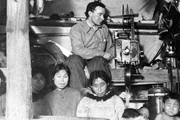 Wilkins showing films to Inuit people in the Arctic, Christmas 1913.
