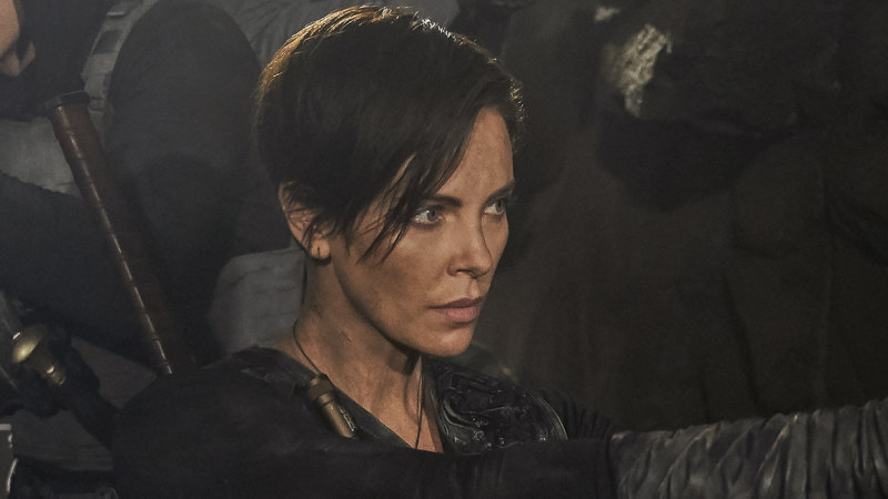 Old Guard Theron S Ageless Presence Brightens An Overly Familiar Plot