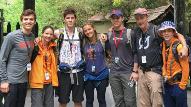 Isabella de la Houssaye and her husband, David Crane, with their five children at the bottom of Malaysia's Kota Kinabalu, the highest mountain in south-east Asia, in 2015.